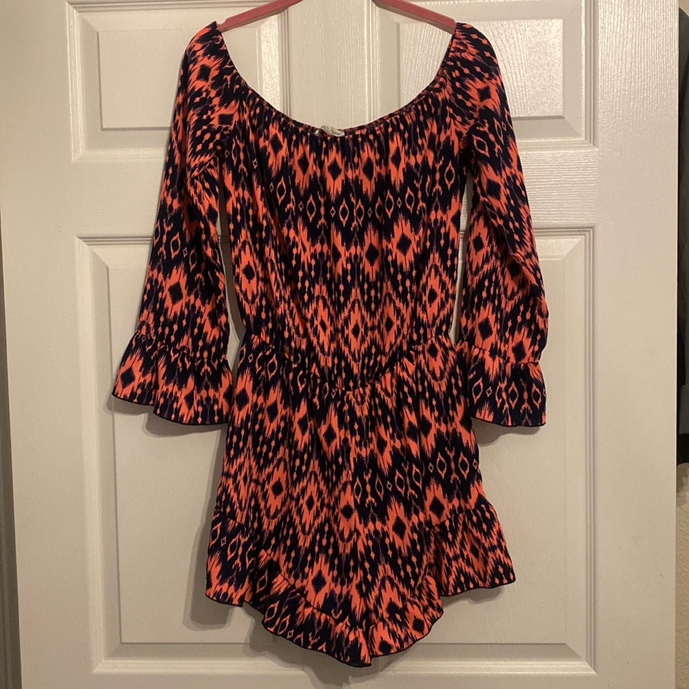Pink and black Charlotte Russe Romper